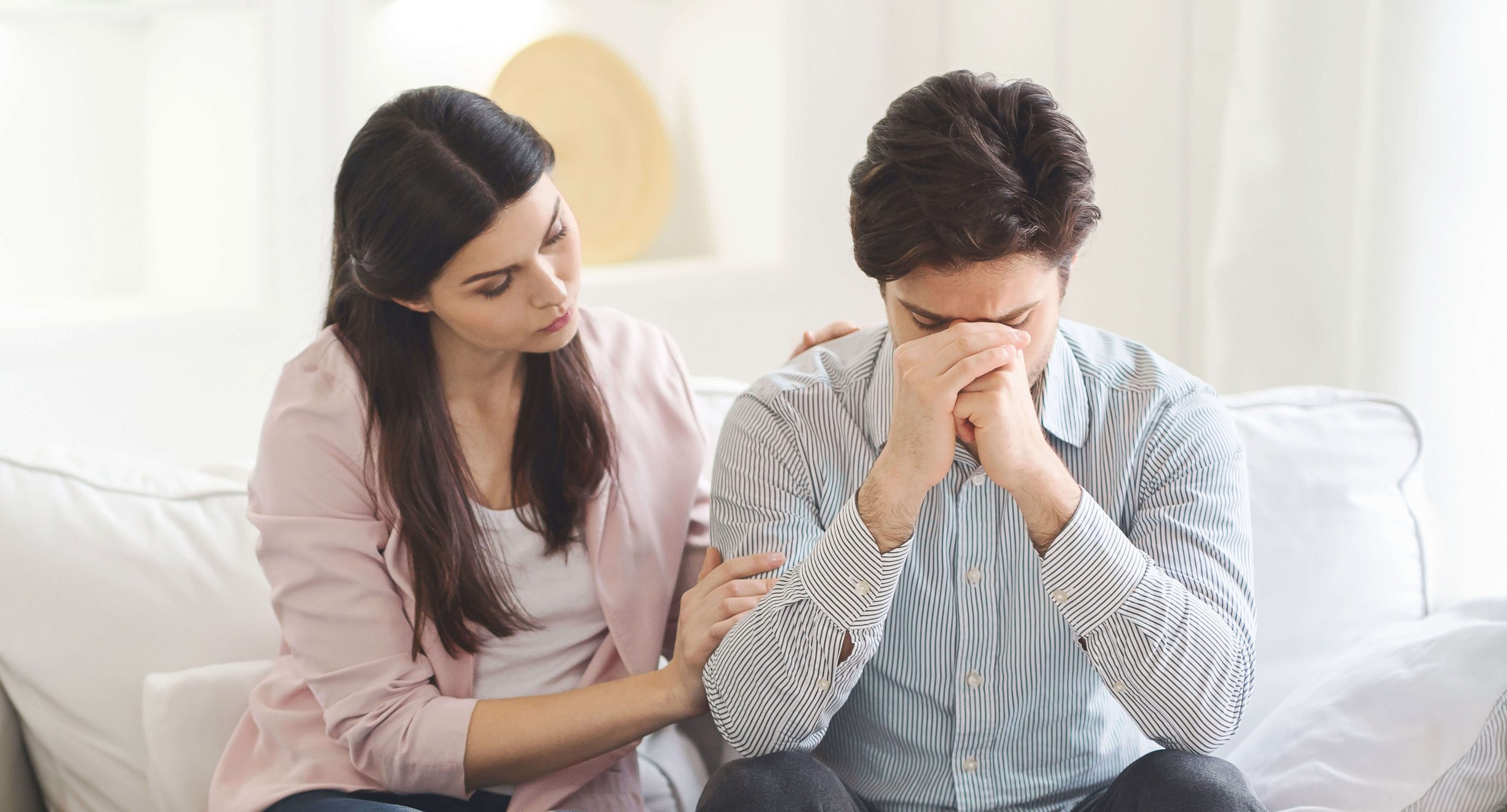 8.-Spousal-Support—shutterstock_2474827063 Wife support her sad husband